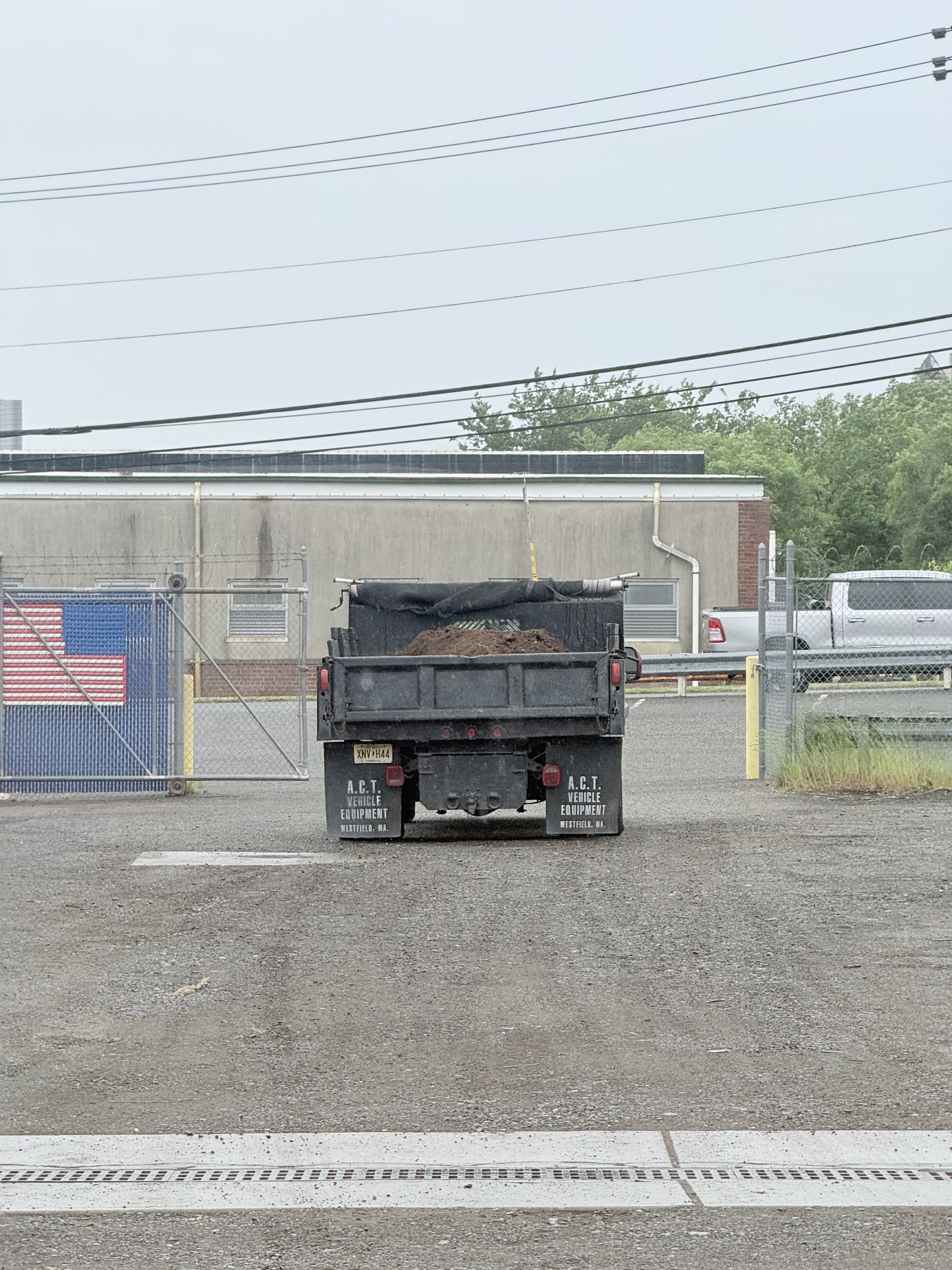 Dump truck with soil